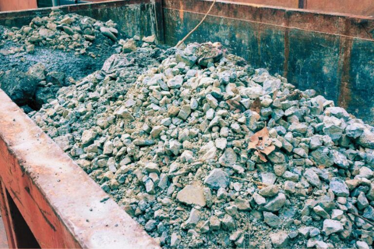 concrete disposal in a dumpster