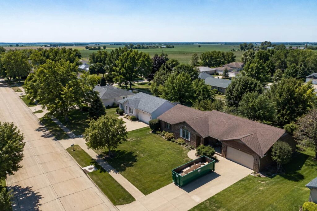 Roll-off dumpster rental Tazewell County IL — container on residential driveway in Central Illinois suburb